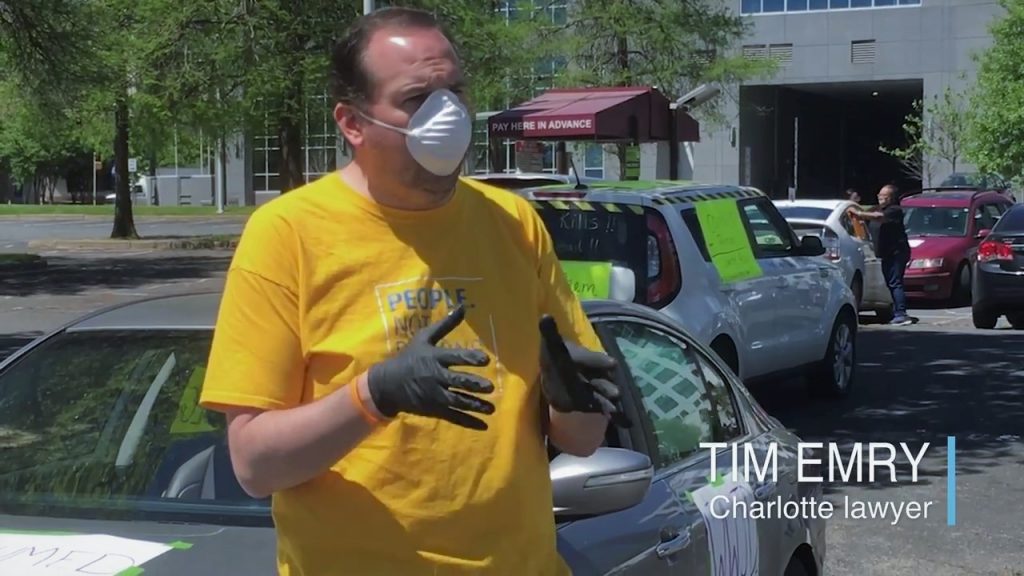 Tim Emry | Charlotte Lawyer in a mask